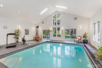 Sliding glass doors open to stamped concrete patio