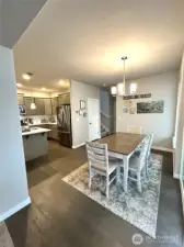 Looking towards stairs from dining area.