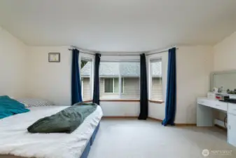 second bedroom on top level has a bay window