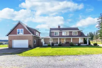 Wonderful light and bright 4 bedroom home with another finished bonus room. (3 bedroom septic system). Two car garage and a Studio Apt above the garage with separate entrance.