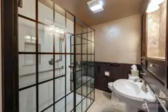 Main floor bath with upgraded walk in shower.