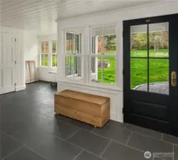 Designed for convenience—drop your boots, coats, and gear in this well-appointed mudroom.