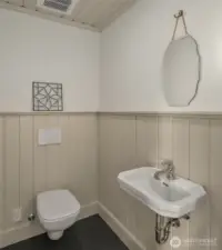 Small in size, big on style—an inviting powder room with exquisite details.