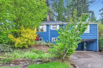 Gorgeous landscaping pops in the spring and summer in this spacious Olympic Hills 4-bedroom home.