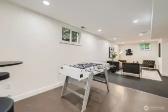 Gaming area with family room beyond.