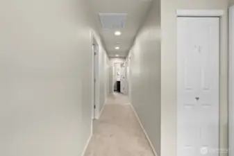 Let‘s move down the hall to see the other bedrooms.