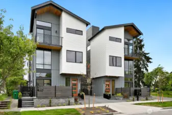 8333A is the home on the left in this photo. Don't miss the fully fenced patio area access through a slider from the main floor living room. There's also a balcony off of the primary suite and a rooftop deck as well.