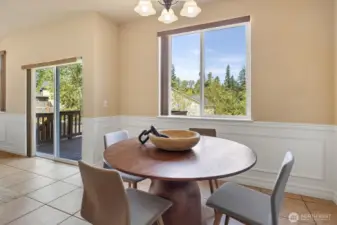 Dining with slider access to the refurbished deck!
