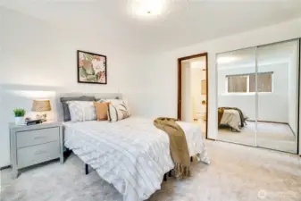 Along with the spacious living room, this lower level of the home includes a 2nd suite excellent for a housemate or long-term guests.