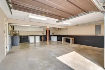 Turn right at the bottom of the stairs into this 589 square foot attached, 2-car garage with a storage room.