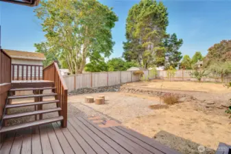 Decorate the lower level of the deck with pots, or set up some outdoor furniture. The sunlight lasts long into the afternoon and evening on this west side of the lot.