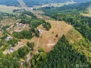 Nearly 20 acres at the end of a peaceful partially paved and gravel road.