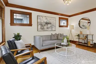 Hardwood floors, coved ceilings, & picture rail.
