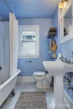 Main floor bathroom features a classic claw foot tub!
