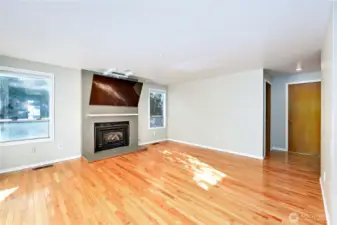 Family room with gas fireplace. *TV doesn't convey