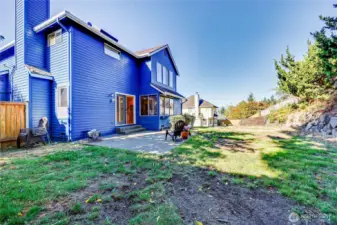 Backyard is fully fenced and has plenty of room to run, play, garden or let your pets explore.