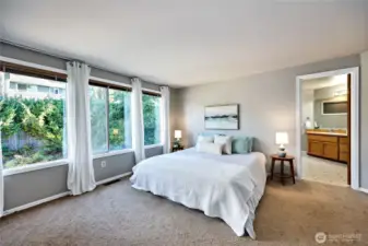 Primary suite with full bath and walk in closet.