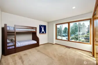 Bedroom #4 of 4 on second floor. Staging is virtual.