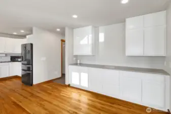 Kitchen Designed with Plenty of Cupboards and Countertops for a all your Culinary Needs  or for Working or Learning from Home