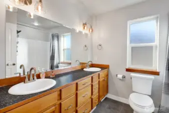 Dual Sinks in the Full Upstairs Bathroom Make Morning Routines Simple and Stress-free!
