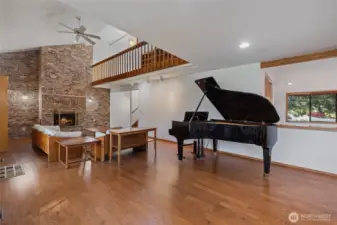 Inviting living space with deck access, large windows, and a harmonious blend of indoor-outdoor living.