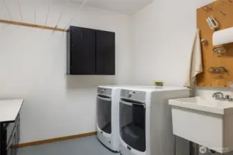 Laundry/Mudroom located downstairs adjacent to garage access.