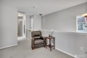 Loft area at the top of the stairs.