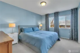 Primary Suite with room darkening shades.