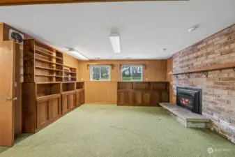 Family room with gas fireplace.  Bookshelves are not attached and easy to remove.