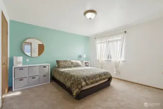 Spacious primary bedroom with walk-in closet