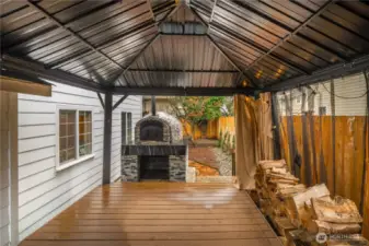 Gazebo covered deck with custom built wood fired oven.  Great outdoor space for relaxing & entertaining.