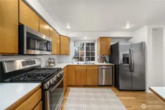 Spacious kitchen with eat-in bar.