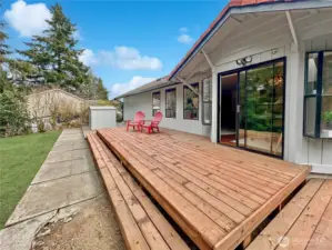 Access new deck off dining area offering a great place to relax and enjoy private rear yard.