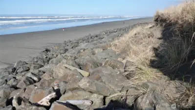 View of the Rock Bulkhead behind the lot along the Beach (looking North/Northwest).