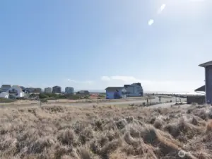 View of the lot (taken from the middle of the lot, and looking Southeast towards the street and Jetty).