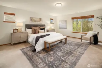 Gorgeous upstairs Primary Suite feels like a peaceful retreat with room for a King Bed, sitting area and additional storage furniture.