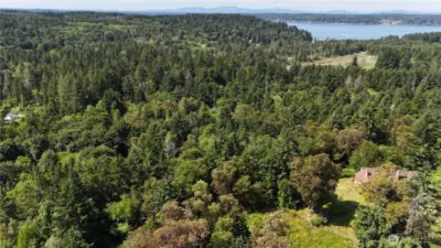 This great lot gives you privacy. With neighbors a good distance away. A short distance to nearby lakes and the Puget Sound for boating, beaches, fishing, and all water activities!