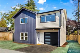 Front View 2 - 1 car garage and private driveway