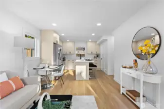 Flow from the living room through dining to kitchen