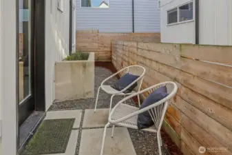 The fenced outdoor area provides options for pet and a place to enjoy the fresh air.