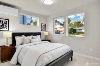 two additional bedrooms have windows an two walls.