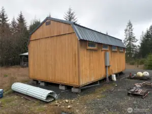 Power can be connect to tiny home with power conduit from power meter to the shed.