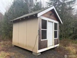 3rd out building with exterior 110 power connection for the interior of building.