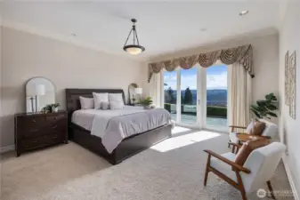 Luxurious primary suite retreat with private patio access