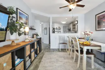 Beautifully updated...the dining area is topped with a ceiling fan & the kitchen has been opened up to enjoy the view & unite the rooms.