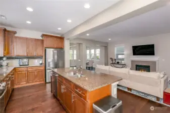 Spacious kitchen with large island and gorgeous floors.