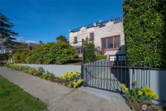 Gated courtyard entry with gated driveway