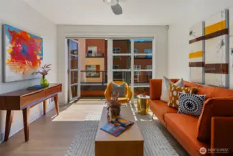South facing wall of windows shines bright throughout the day.
