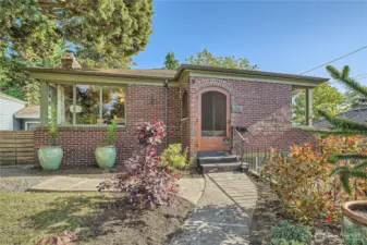 Cape Cod with easy-care brick and Vestibule entrance.