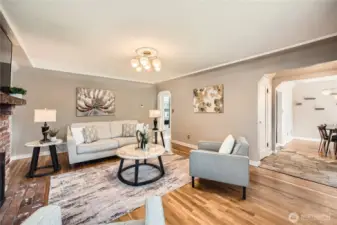 Living Room with coved ceilings. Open to Entry and circle through the second doorway to a Central Hall.